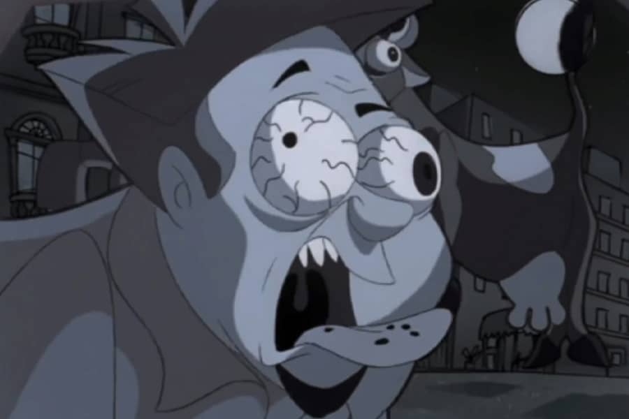 man with bloodshot eyes and open mouth with tongue hanging out