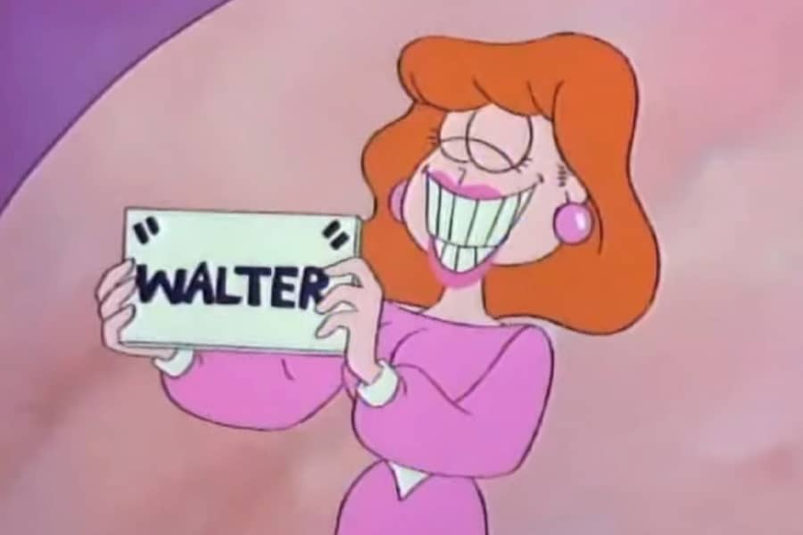 woman holding a card that says “Watler”