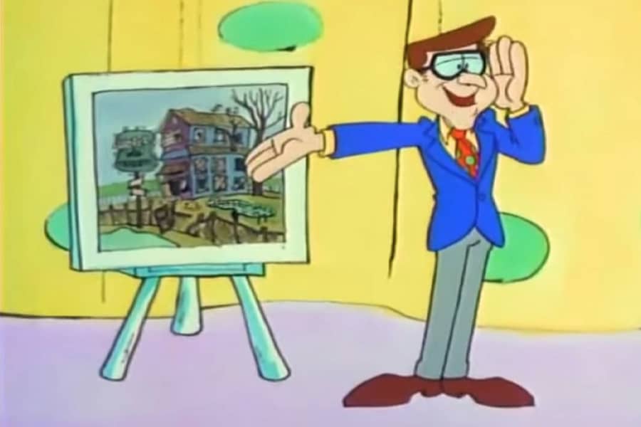 Gary the announcer with a photo of an old hotel