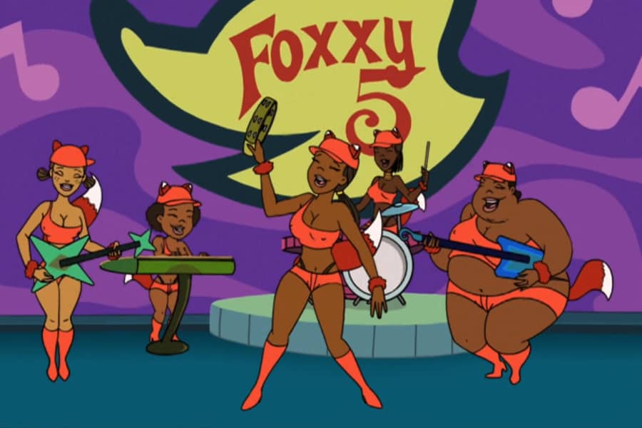 The Foxxy 5 on stage performing