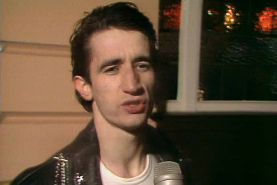 a young white man giving an interview