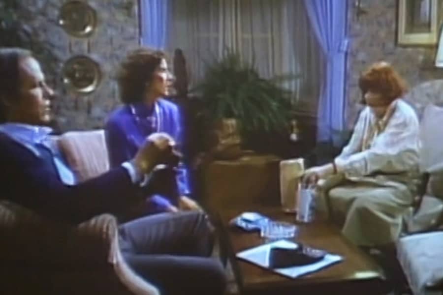 man and woman talking with mother-in-law