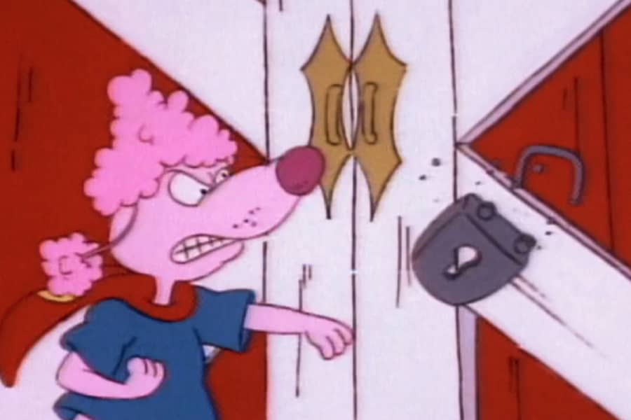 Oodles punching a lock off a barn door