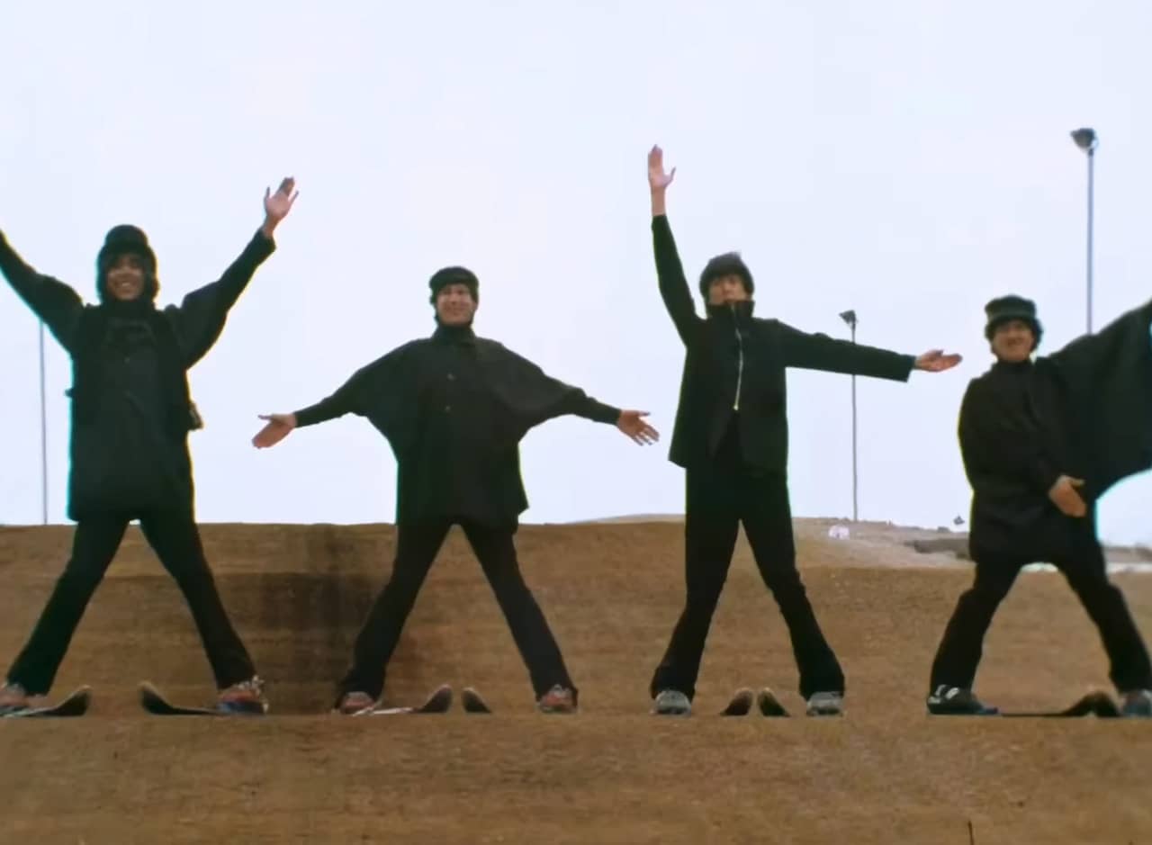 the Rutles making letter shapes with their bodies