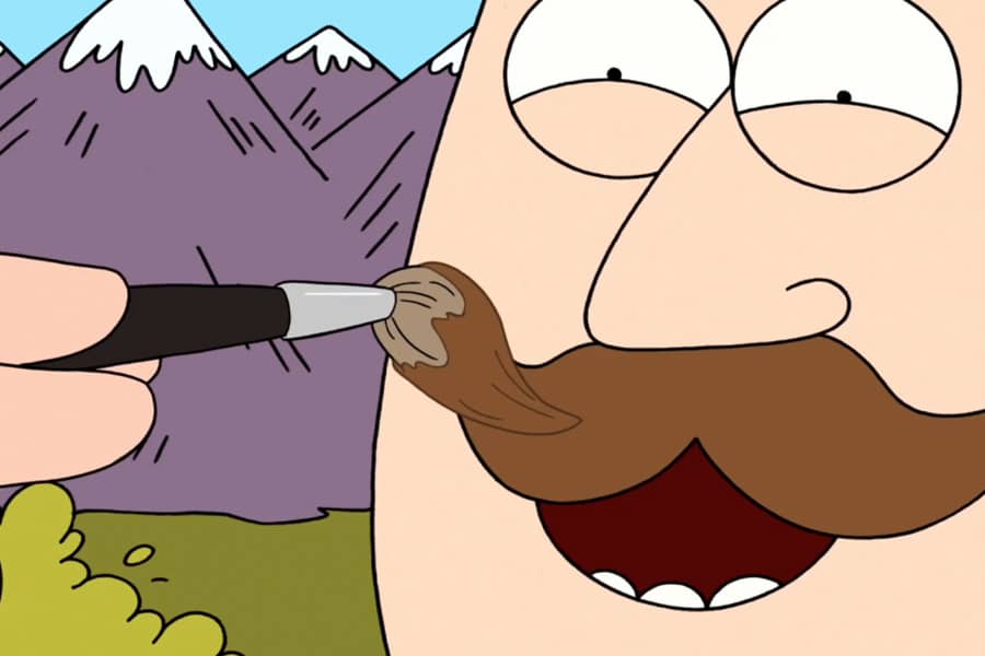 closeup of a paintbrush painting the moustache