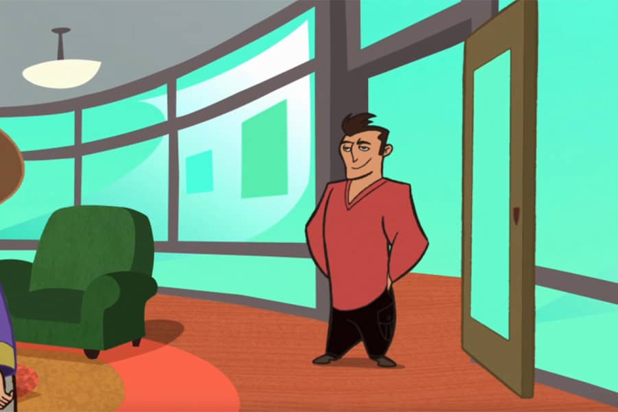 brunette man posing in the doorway of the coffee shop