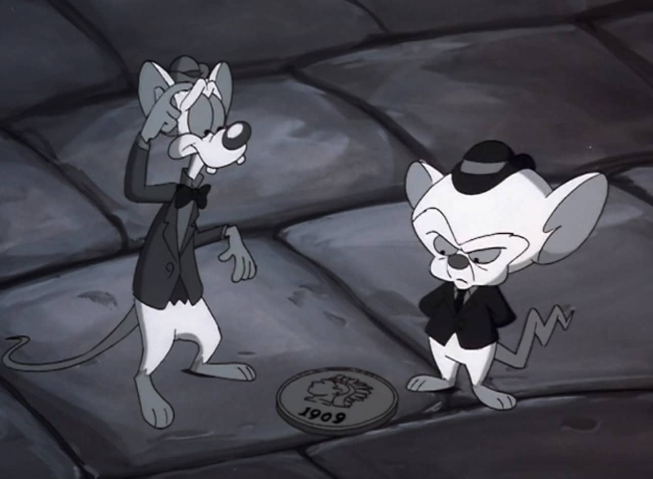 Pinky and Brain standing on the street next to a penny