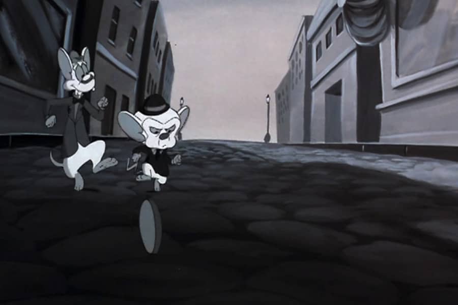Pinky and Brain chasing the penny as it rolls down the street