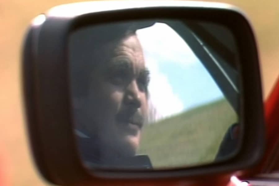 Steve Pising’s reflection in the side mirror