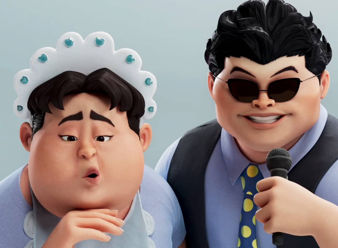 two hosts, one is wearing a baby bonnet