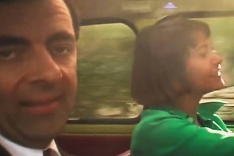 Mr. Bean and Sabine driving in the car