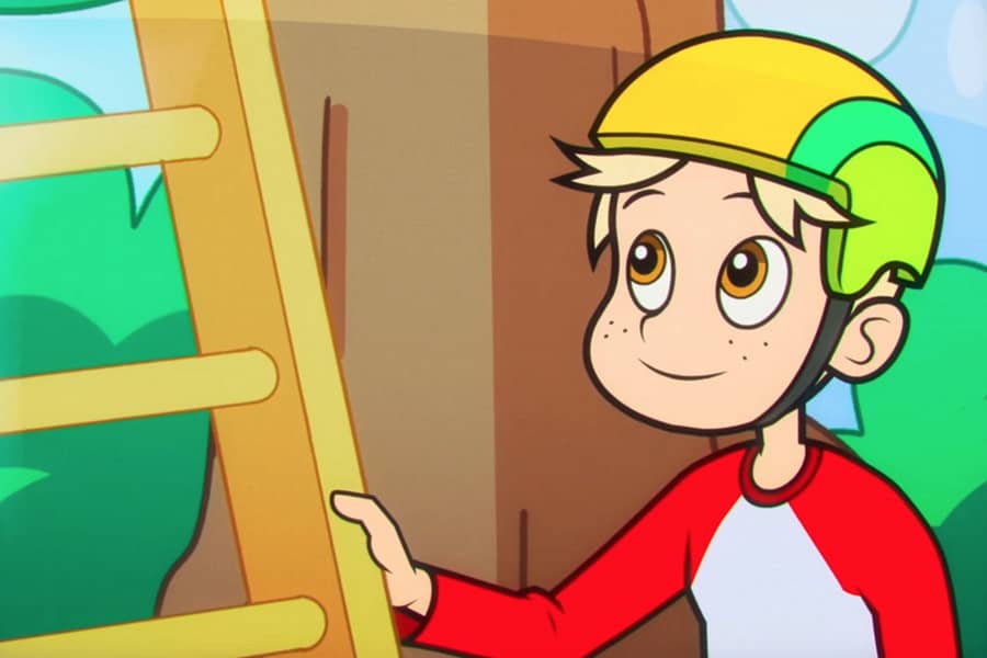 the young boy wearing a helmet and standing by a ladder