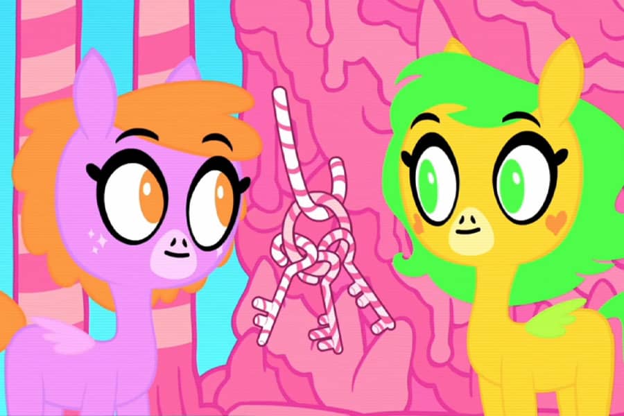 Butterbean and Sparkleface in a candy dungeon next to some floating candy keys