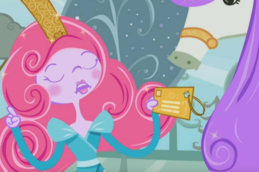 Princess holds up the gift label