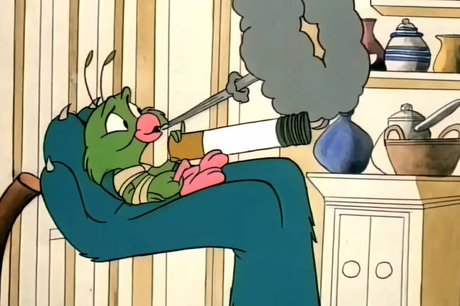 Pudgy smokes a cigarette