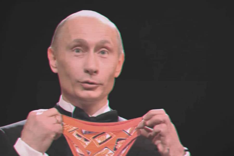 Putin holding up a pair of colorful underwear