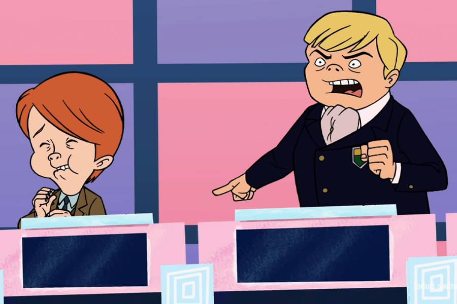 boy contestant pointing angrily at another contestant