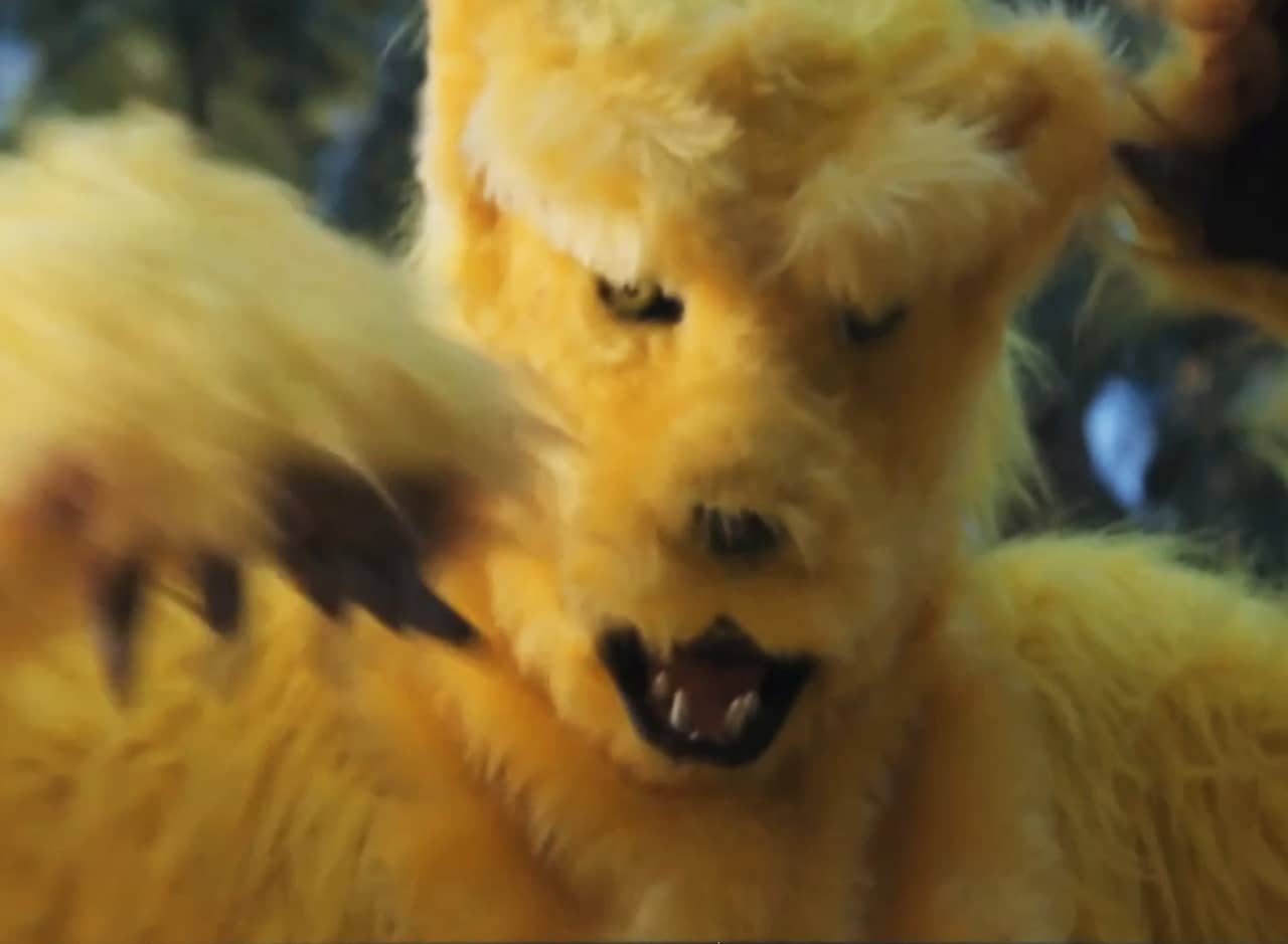 person in yellow panther costume