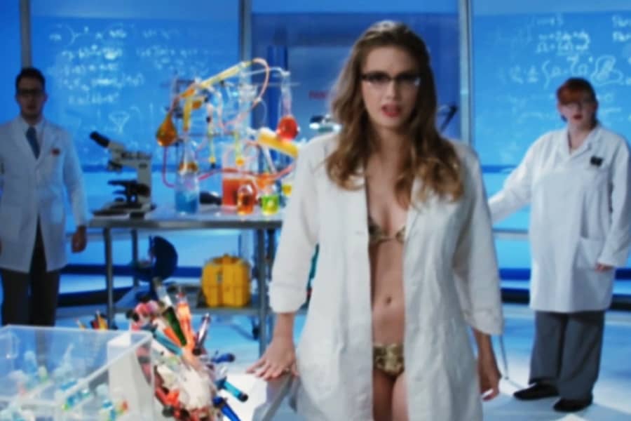 woman scientist in a bikini under her labcoat