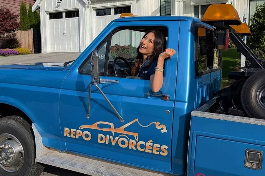Desirée smiling in the Repo truck