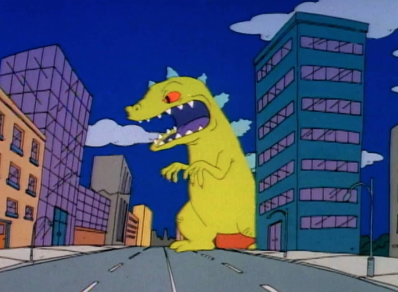 Reptar, a giant t-rex, stomps through the city