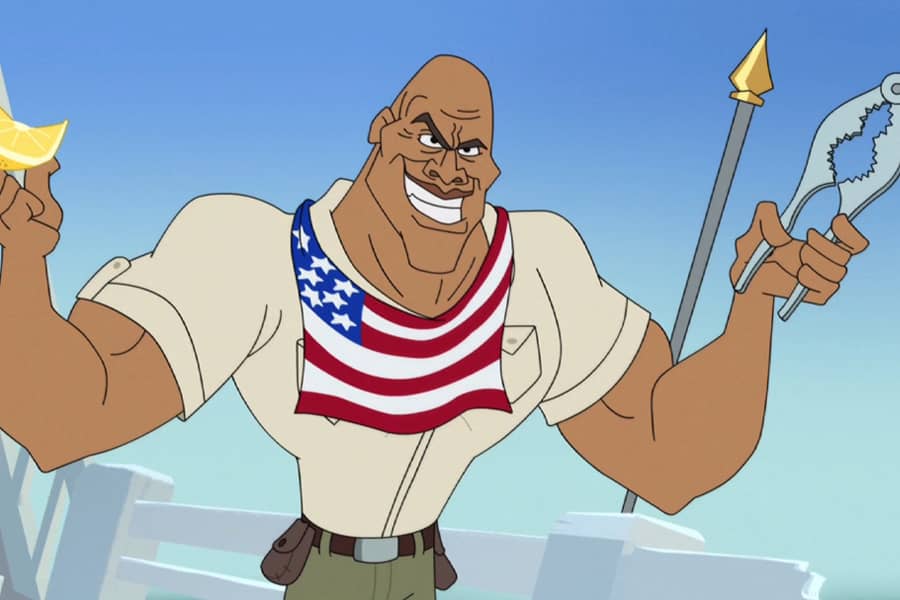 Johnson wearing an American flag big and holding a slice of lemon and a crab cracker