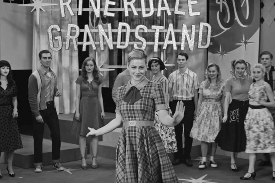 Betty Cooper dancing with teens watching