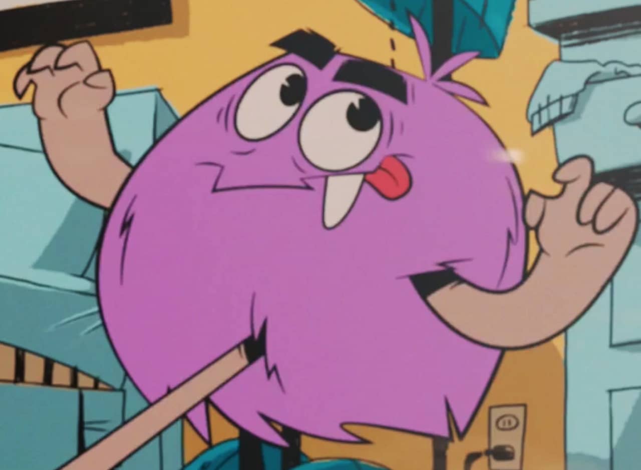 Roscoe, a pink hairy blob creature with thick eyebrows and a snaggle tooth