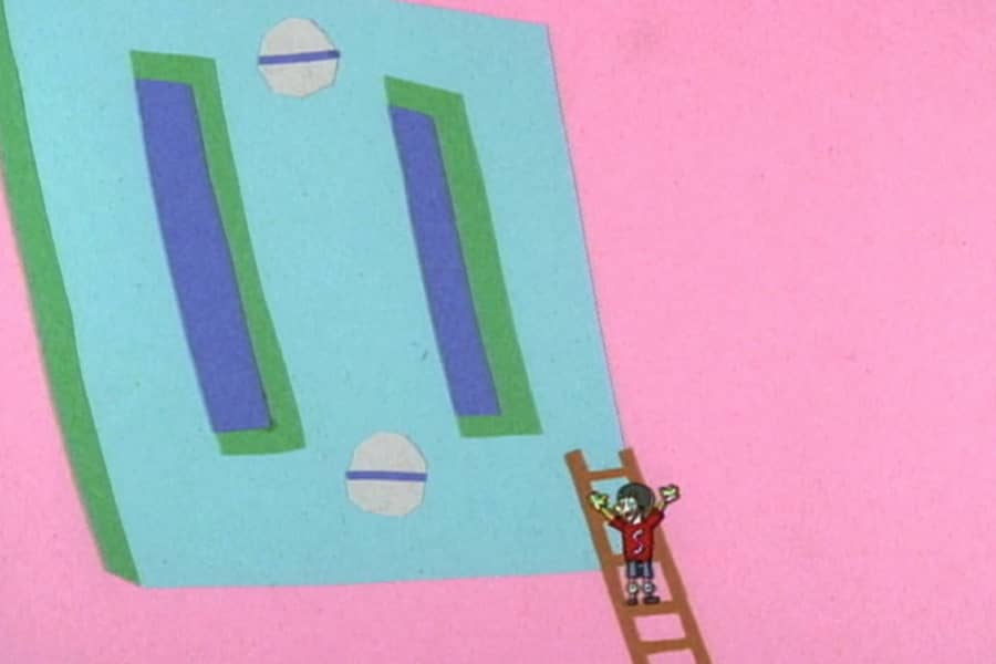 Safety Sammy on a ladder by a giant electrical outlet