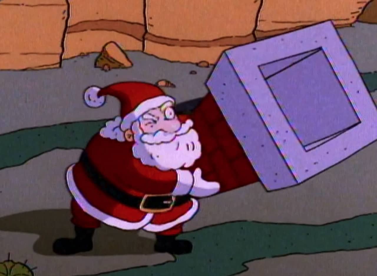 Santa holding a chimney cannon