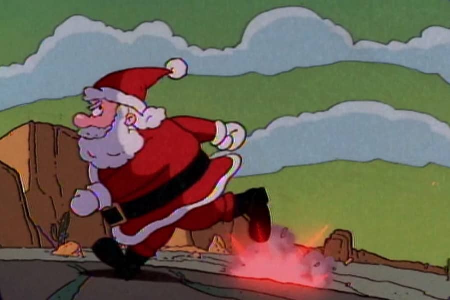 Santa running as lasers explode behind him