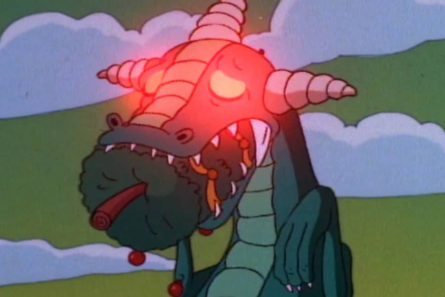 dinosaur alien sad with a Christmas tree in his mouth
