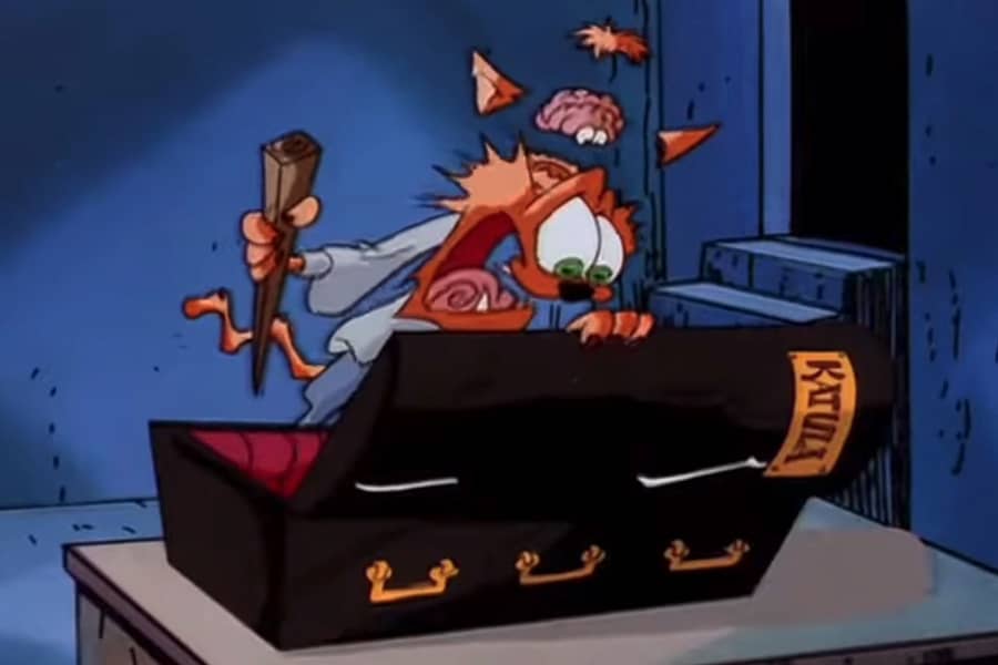 Scaredy-Kat opening a coffin and screaming, his brain jumping out of his head