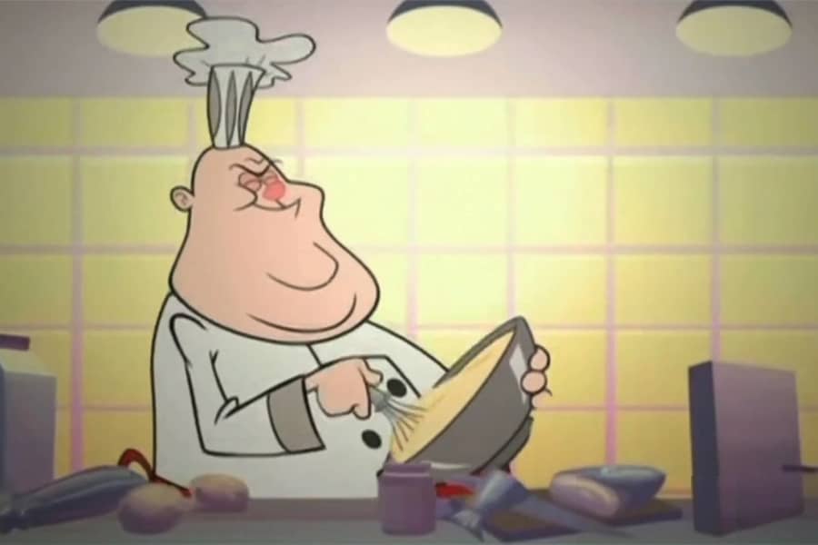 chef stirring some batter