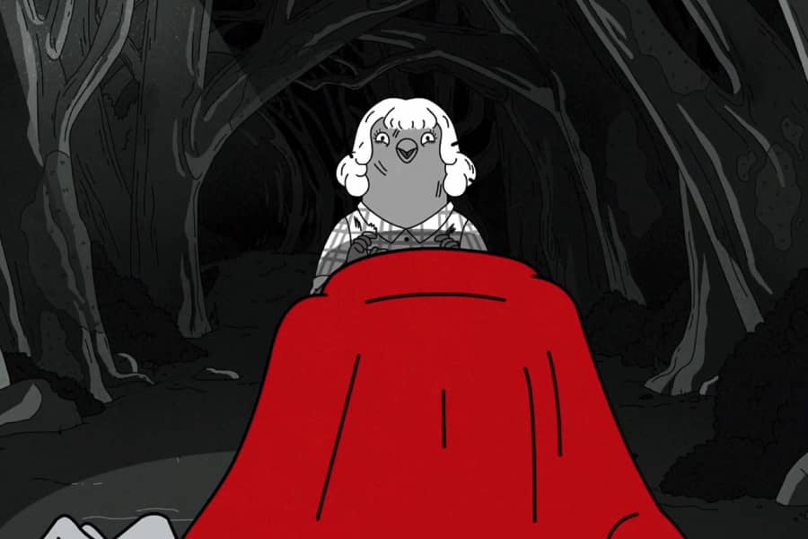 back of red-haired woman closing in on the other woman