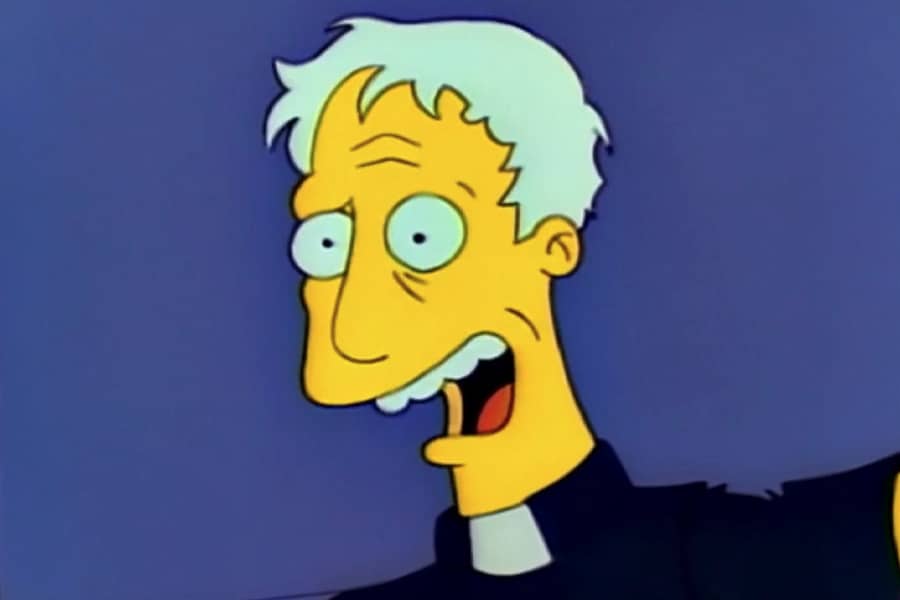 Father McGrath looks disheveled and fanatical