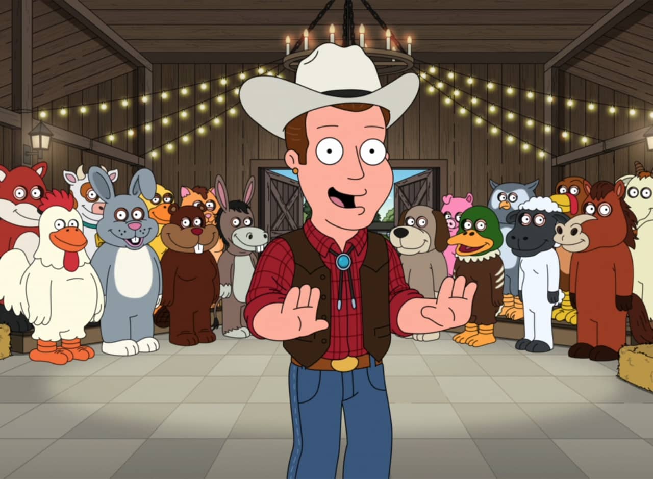 cowboy host in front of a bunch of people in animal costumes