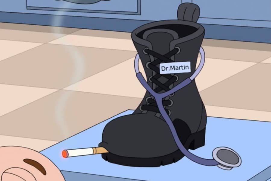 a Dr. Martin boot wears a stethescope and smokes a cigarette