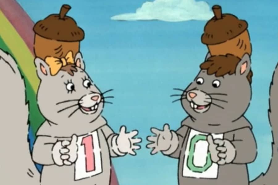 two squirrels with acorns on their heads