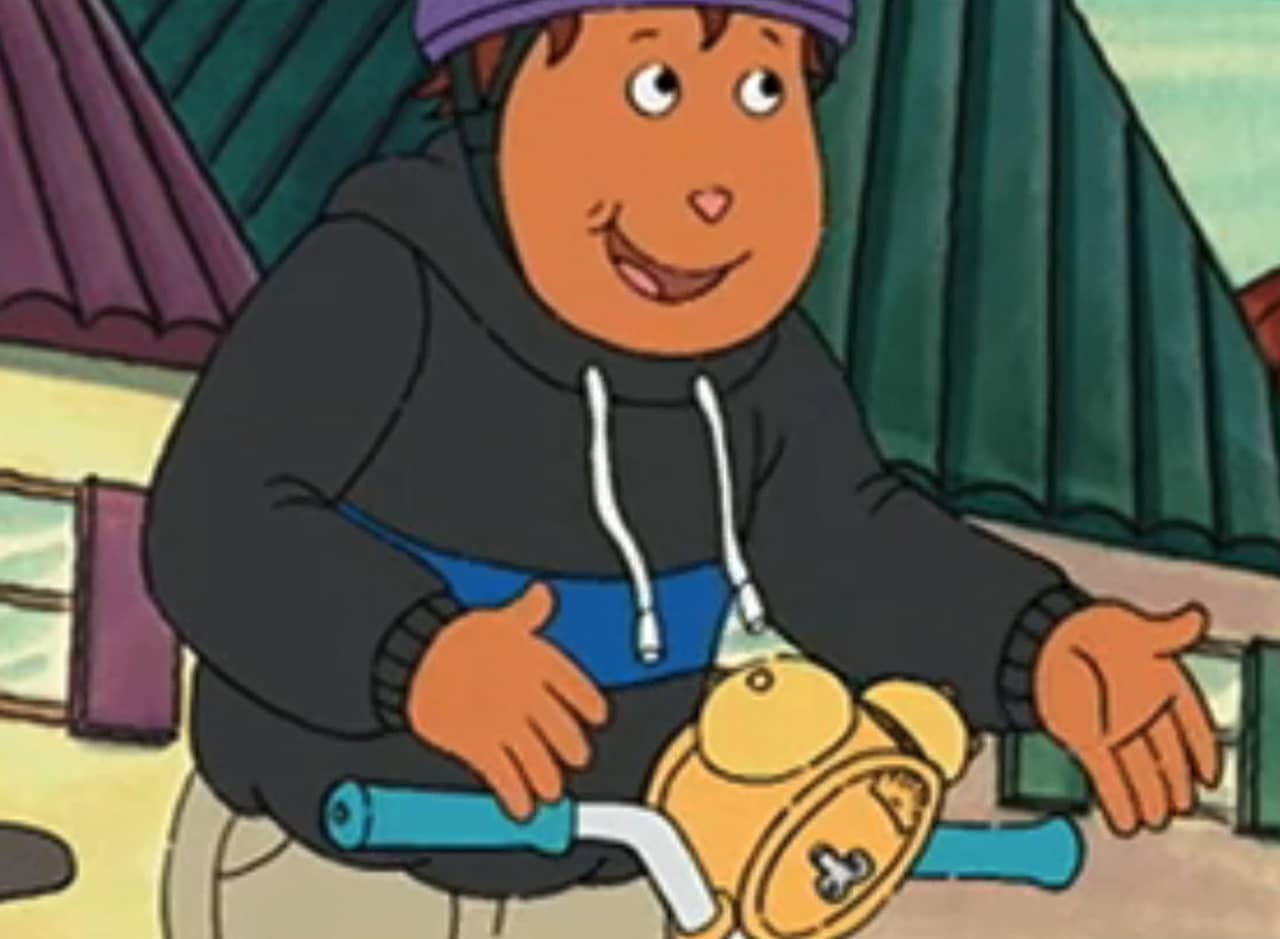 Slappy Blackhead, a teen on a bicycle with an alarm clock attached