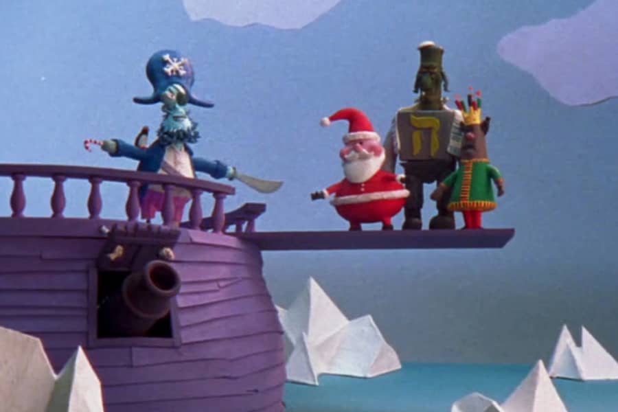 Snowflake Jake making Santy Claus, Dreidelstein, and King Kwanzaa walk the plank