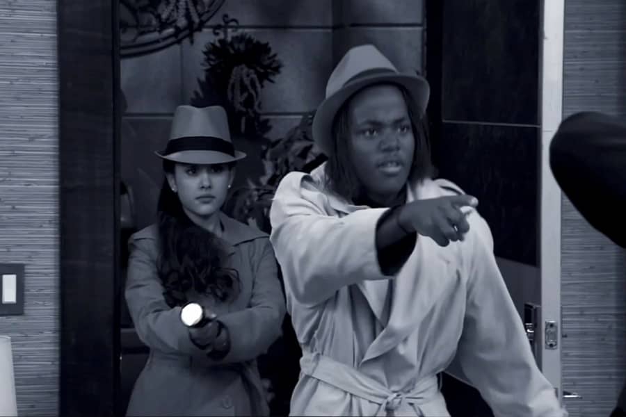 two detectives entering the apartment