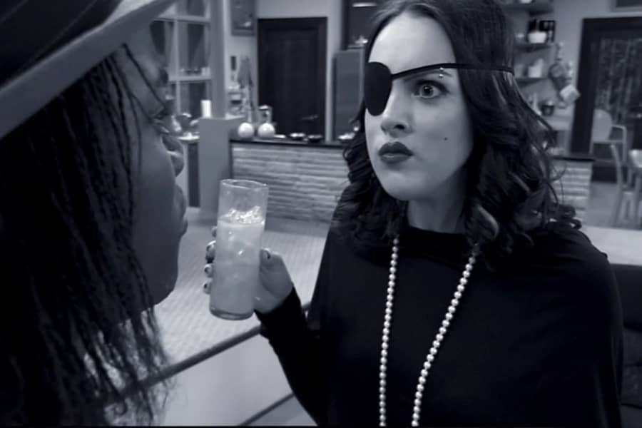 Mrs. Bowman glares at the detective