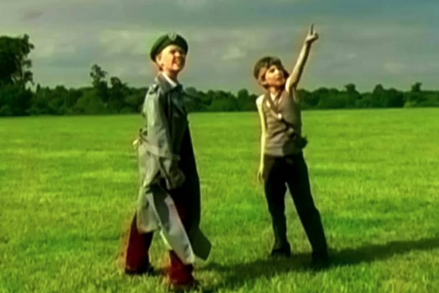 the two boys look up at the sky