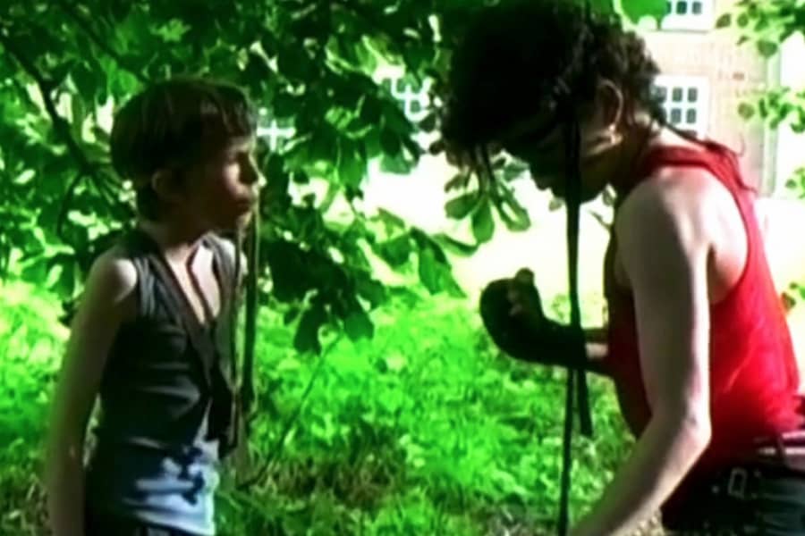 Will talks with his brother, also dressed like Rambo