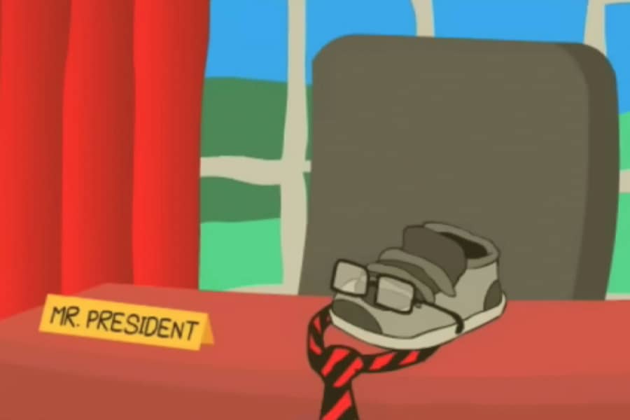 the President is a shoe with a tie and glasses