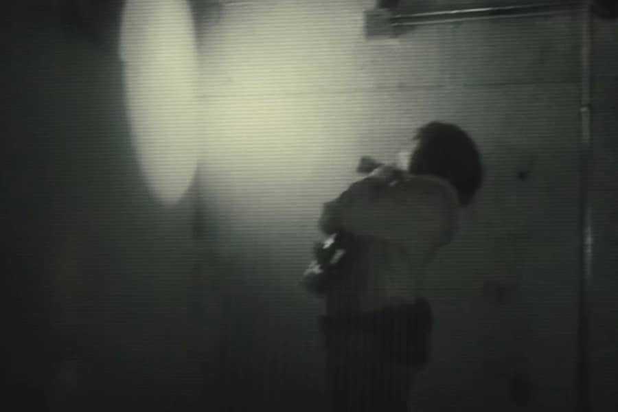 Alex shining a flashlight