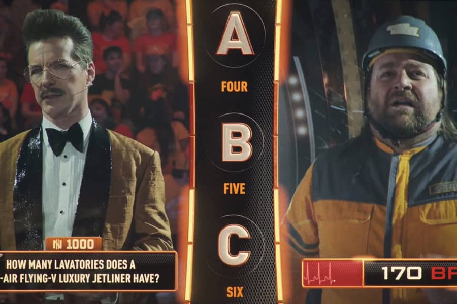 split screen with Gary on the left and Bud on the right, with a multiple choice trivia question in the middle