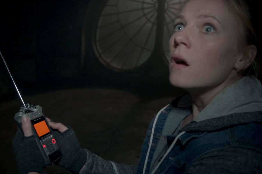 Tracy holding an EMF reader