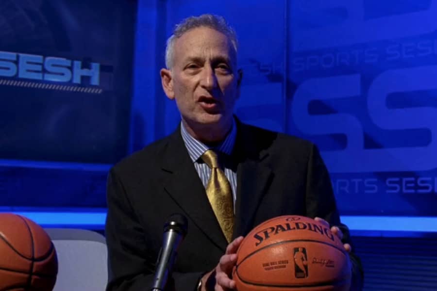 announcer holding a basketball